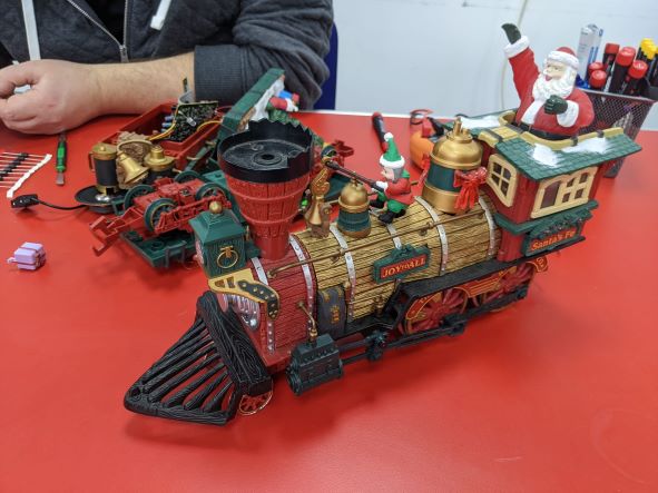 Toy train sitting on a table